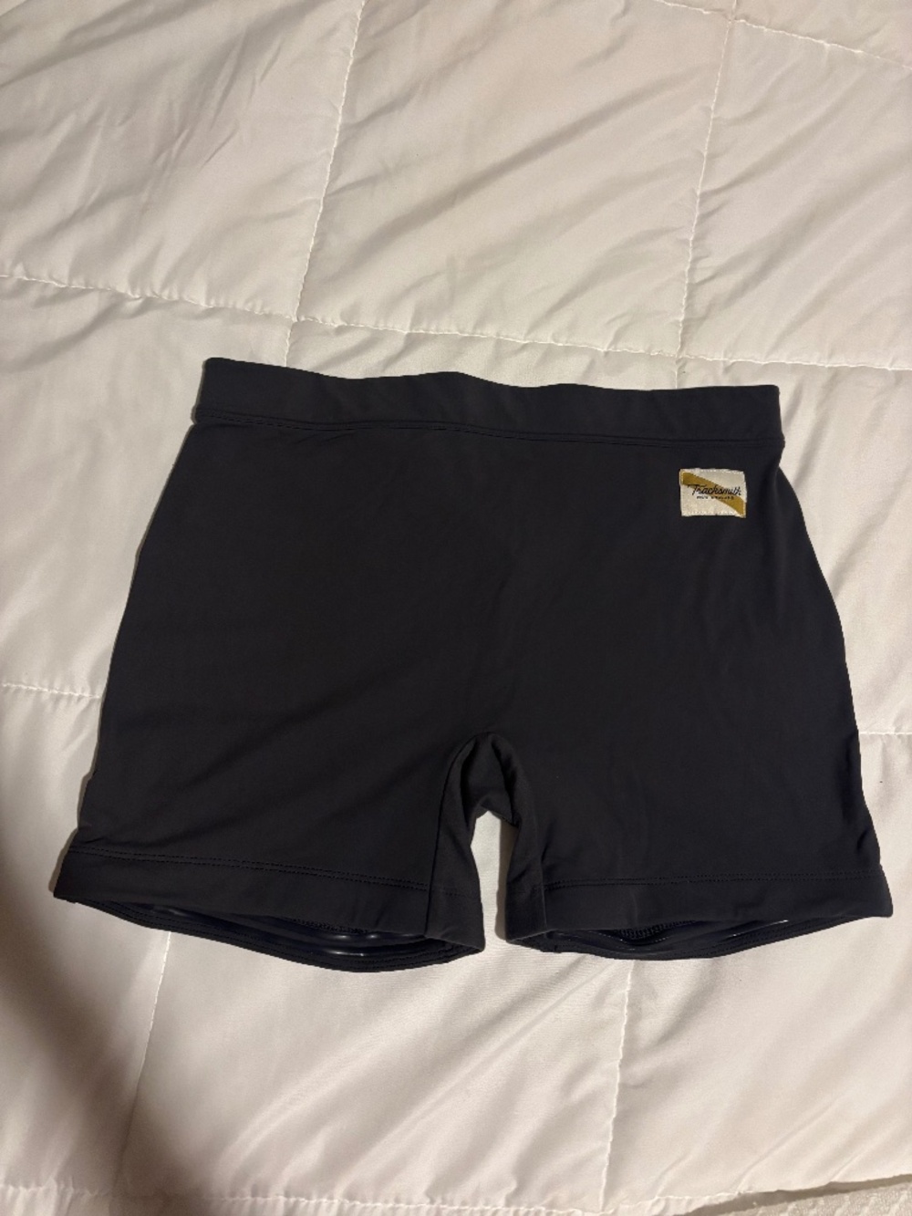 Tracksmith 4.5” turnover shorts